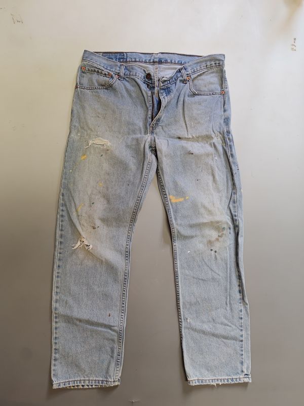 Levis Faded Levis 512 (?) with many signs and holes